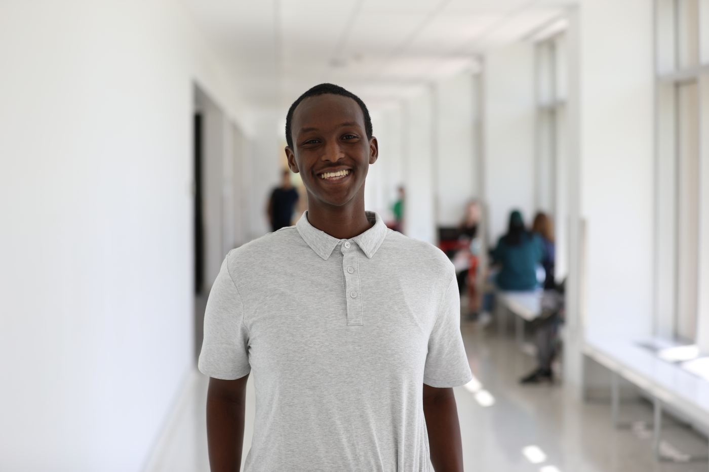 Basheer Anwar in the College Services Hallway